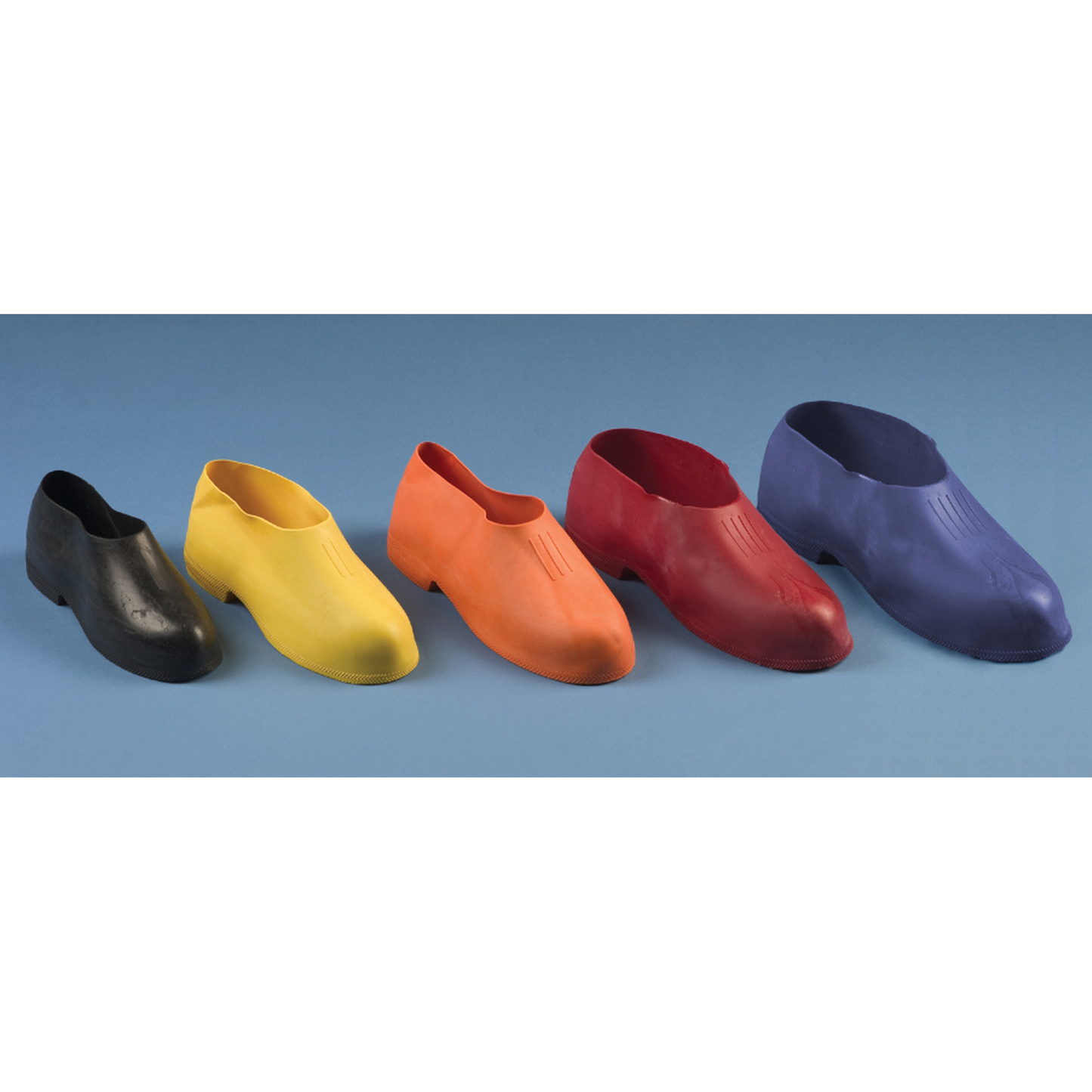 Five colorful shoe covers in black, yellow, orange, red, and purple on a blue background