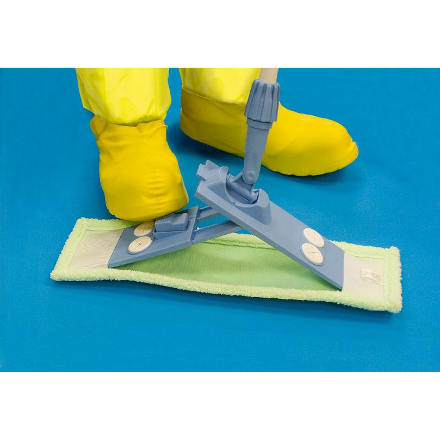 Person using a cleaning tool with a green pad on a blue background