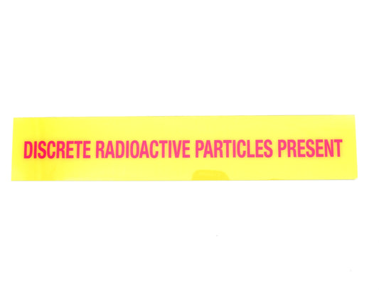 Yellow warning label with red text on a white background