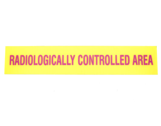 Yellow rectangular sign with pink text 'Radiologically Controlled Area' on a white background