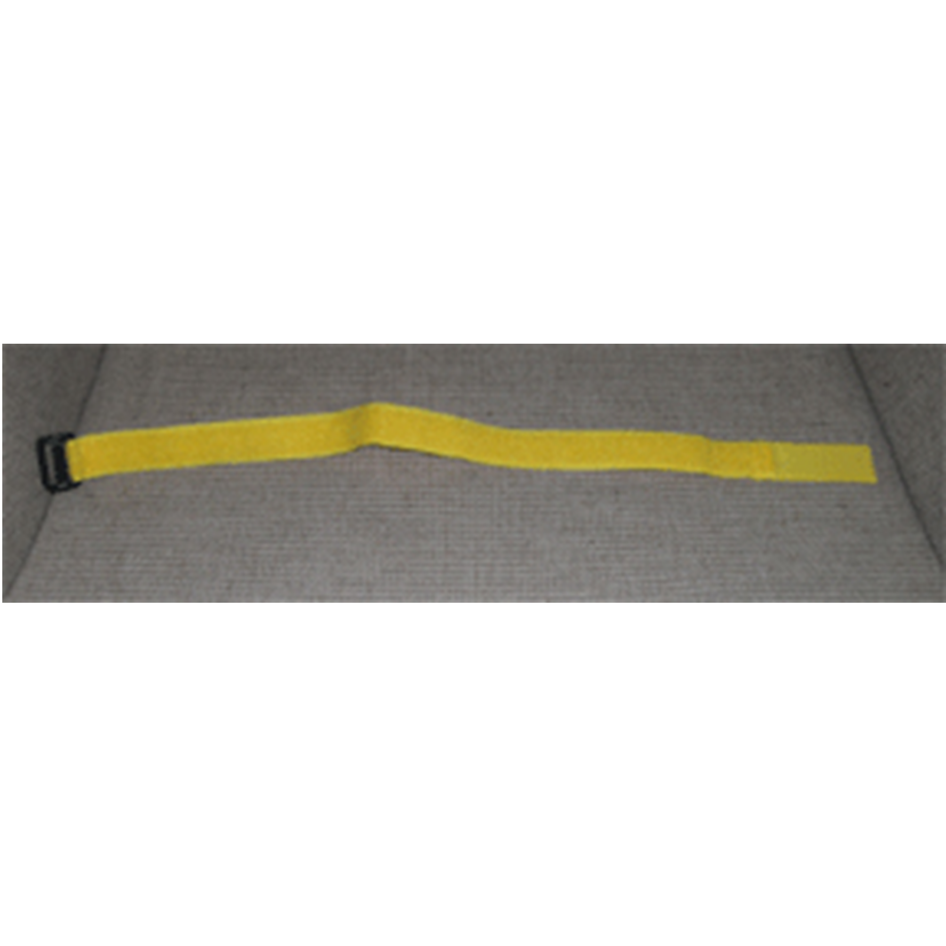 Yellow strap with a black buckle on a gray background