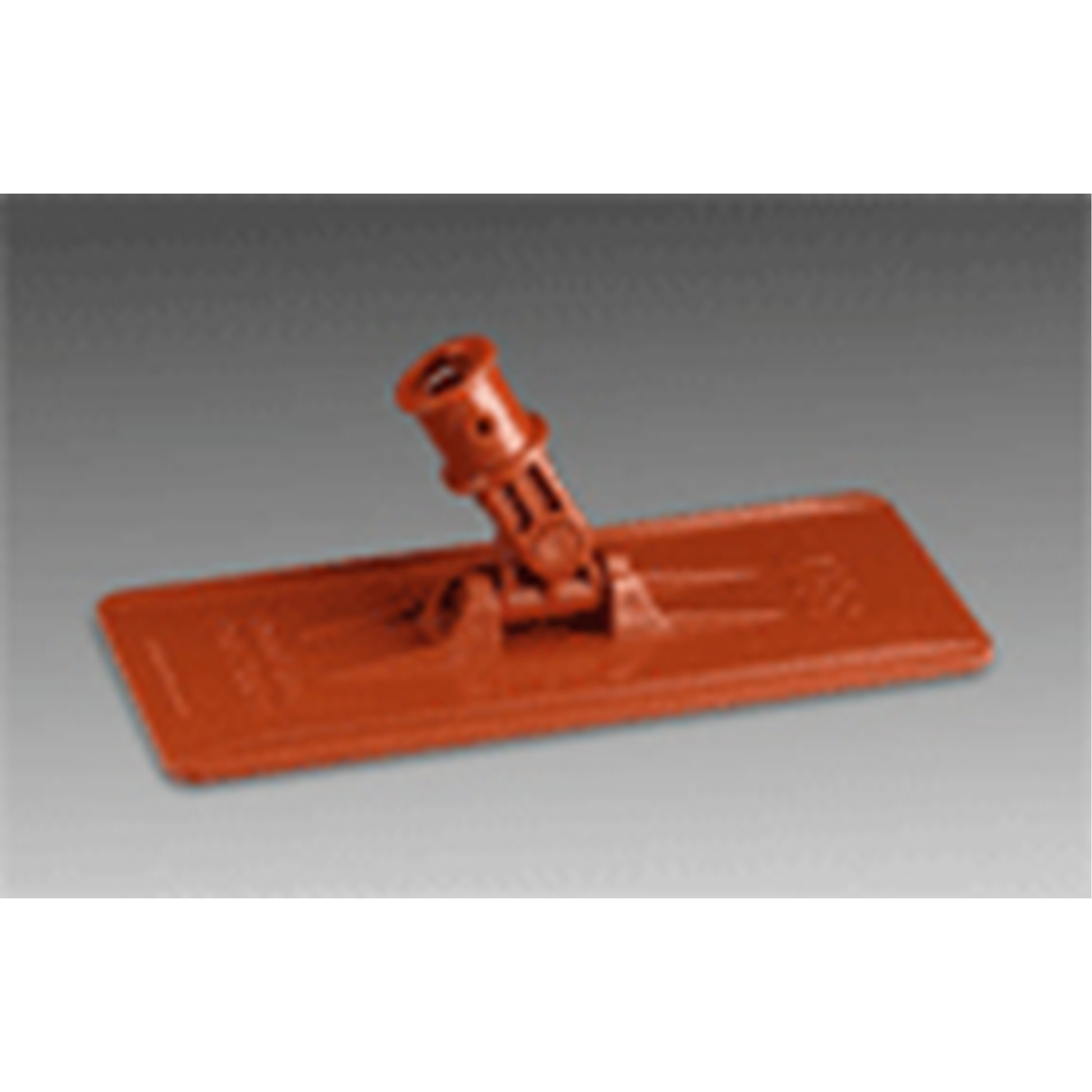 Orange floor cleaning tool on a gray background