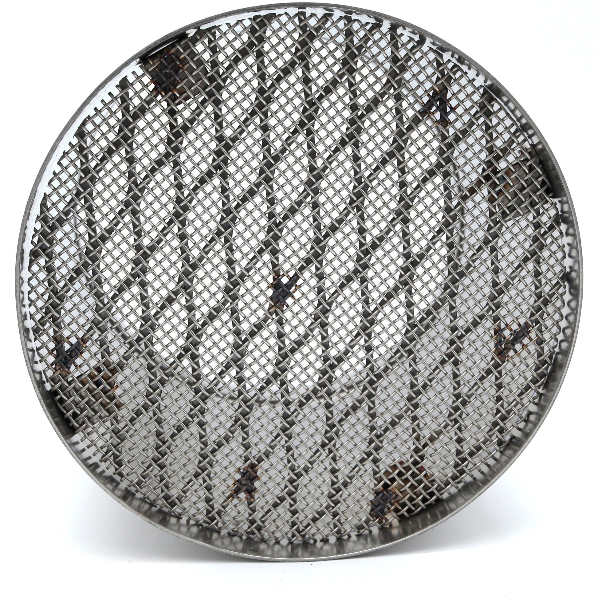 Round metallic mesh filter on a white background