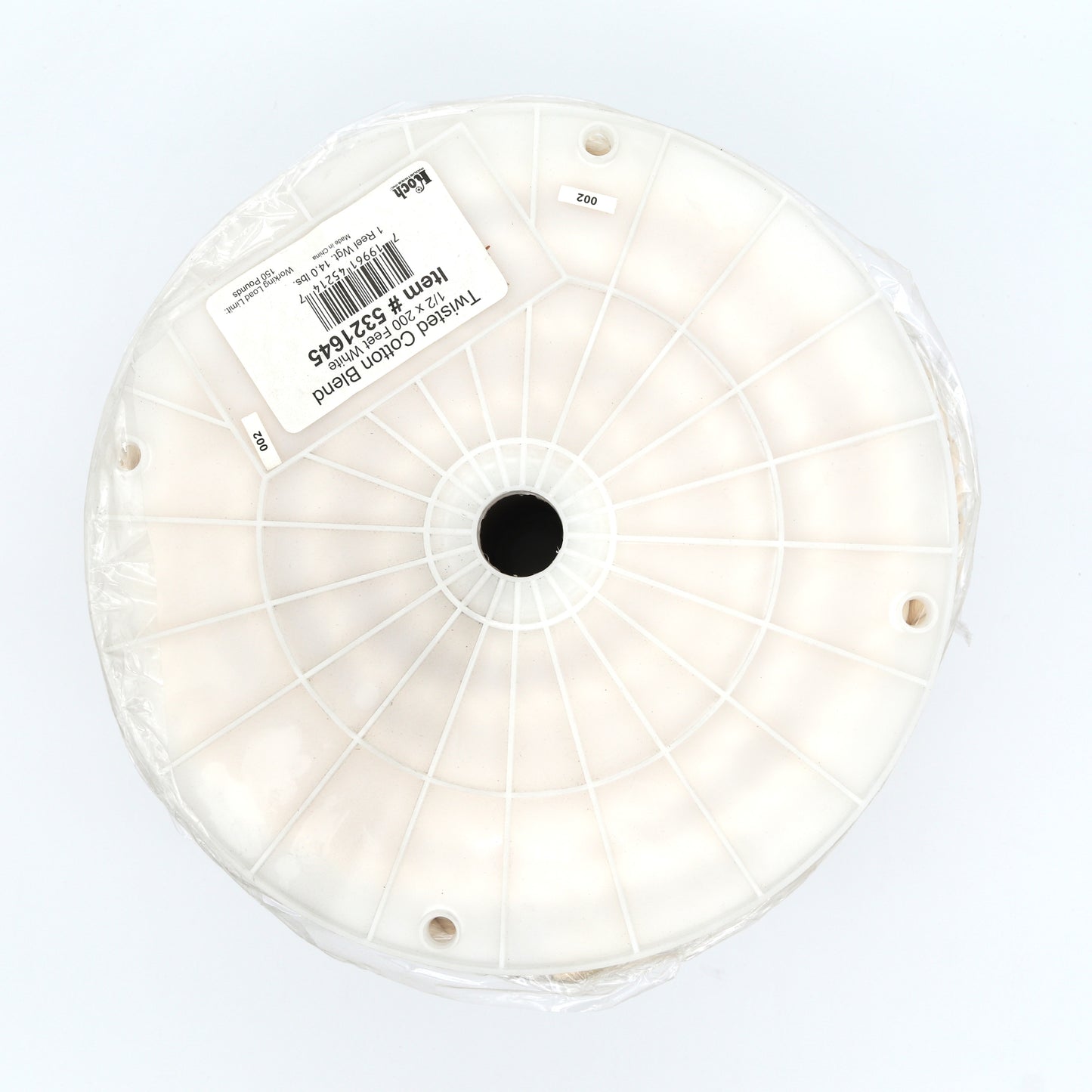 Roll of clear plastic wrap with a label on a white background