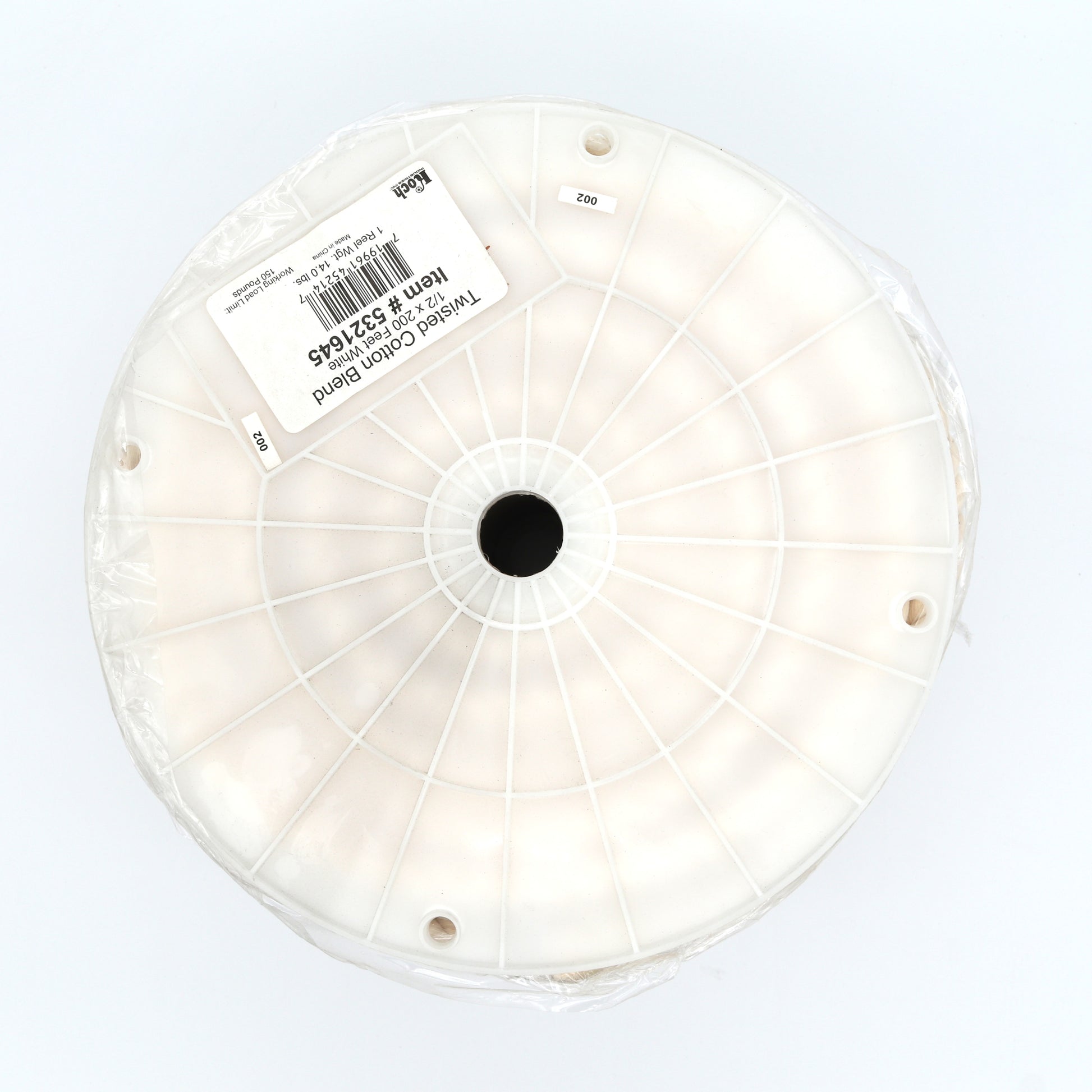 Roll of clear plastic wrap with a label on a white background