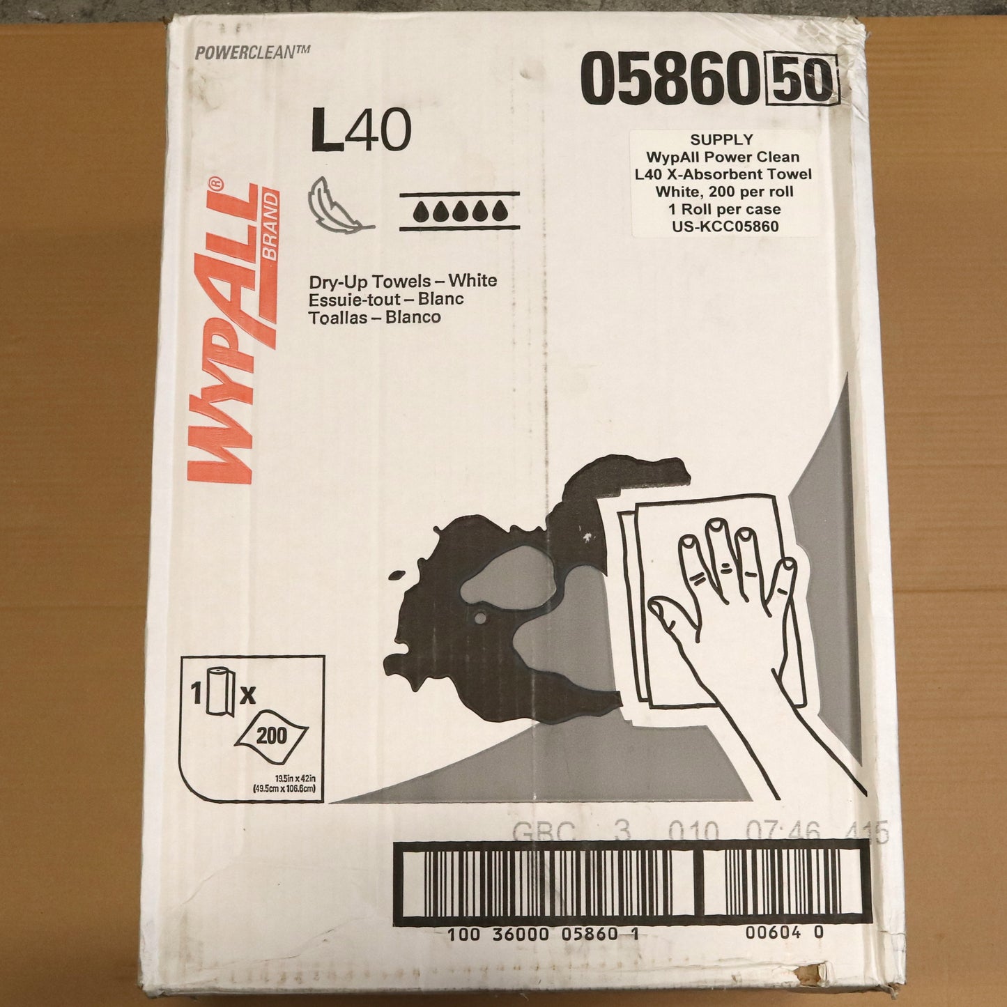 WypAll L40 absorbent towel packaging on a wooden surface