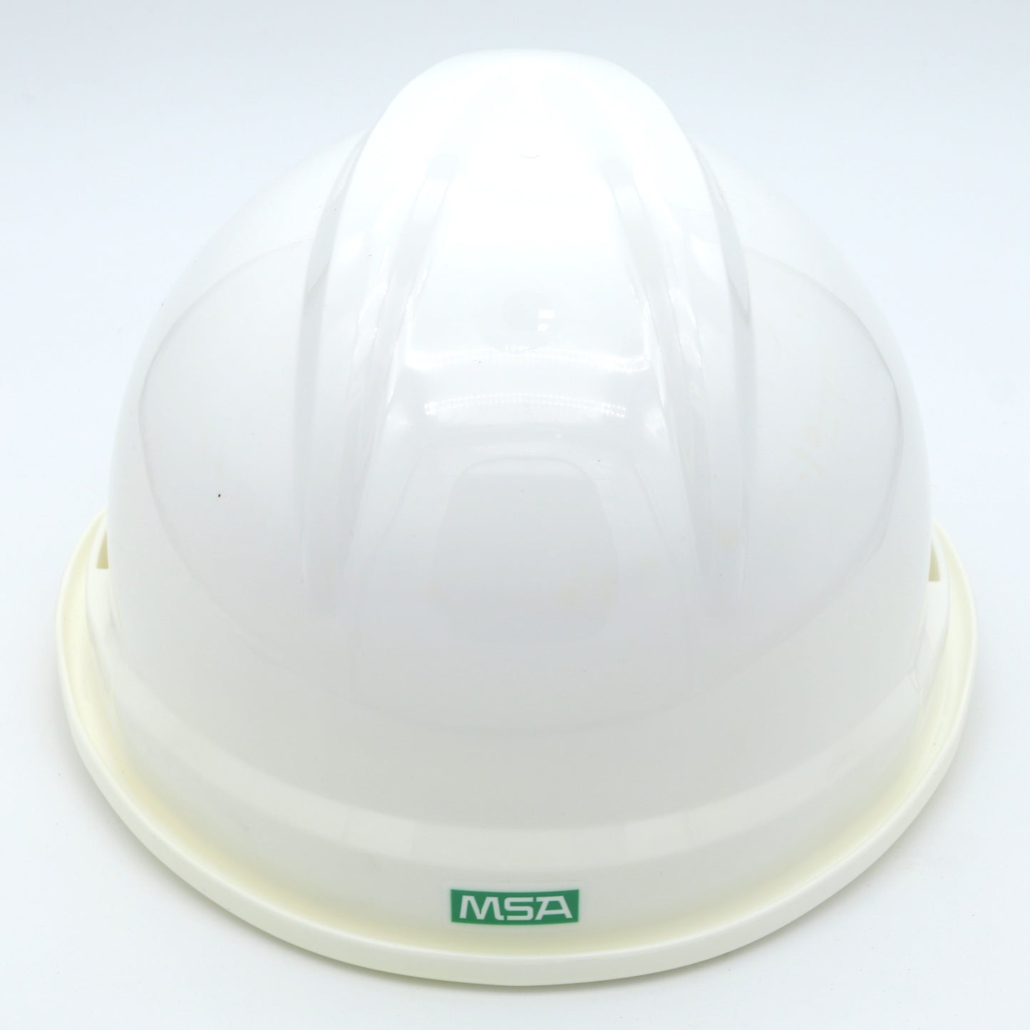 White hard hat with MSA logo on a white background