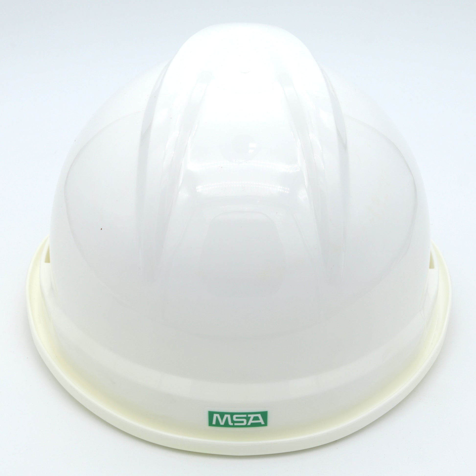 White hard hat with MSA logo on a white background