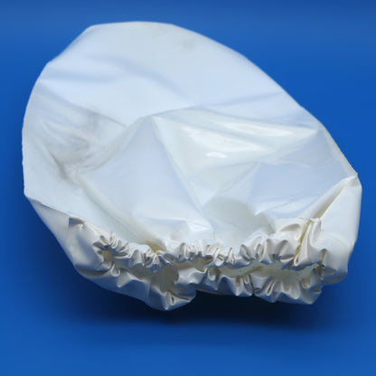White plastic cover on a blue background