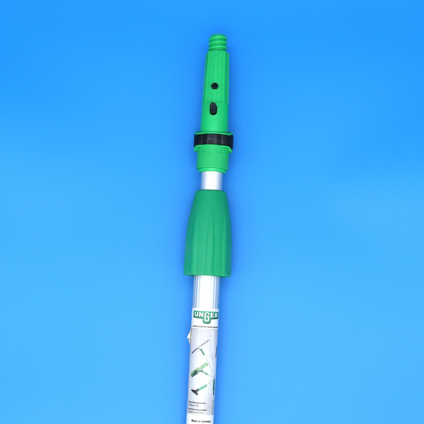 Green and silver telescopic pole on a blue background