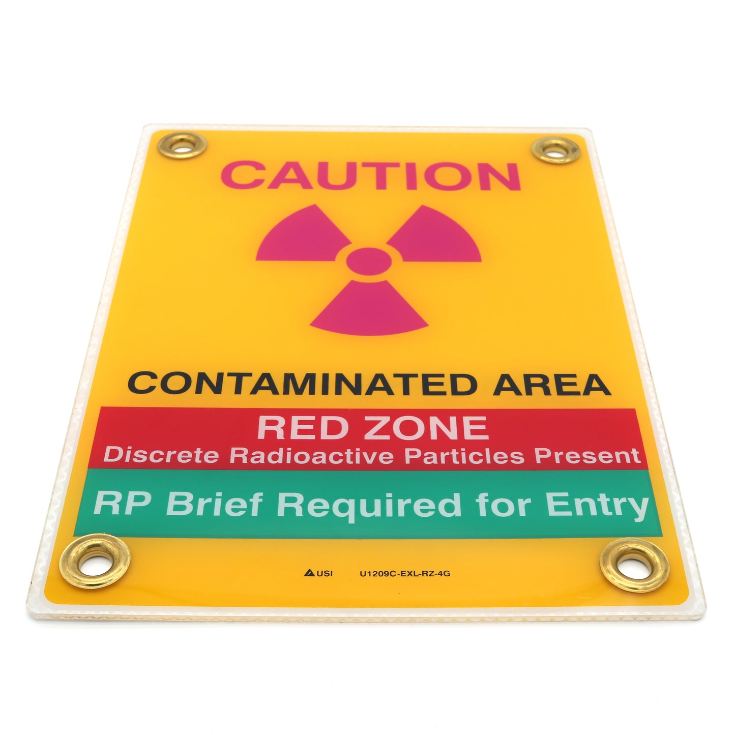 Radiation warning sign with caution and red zone text on a yellow background