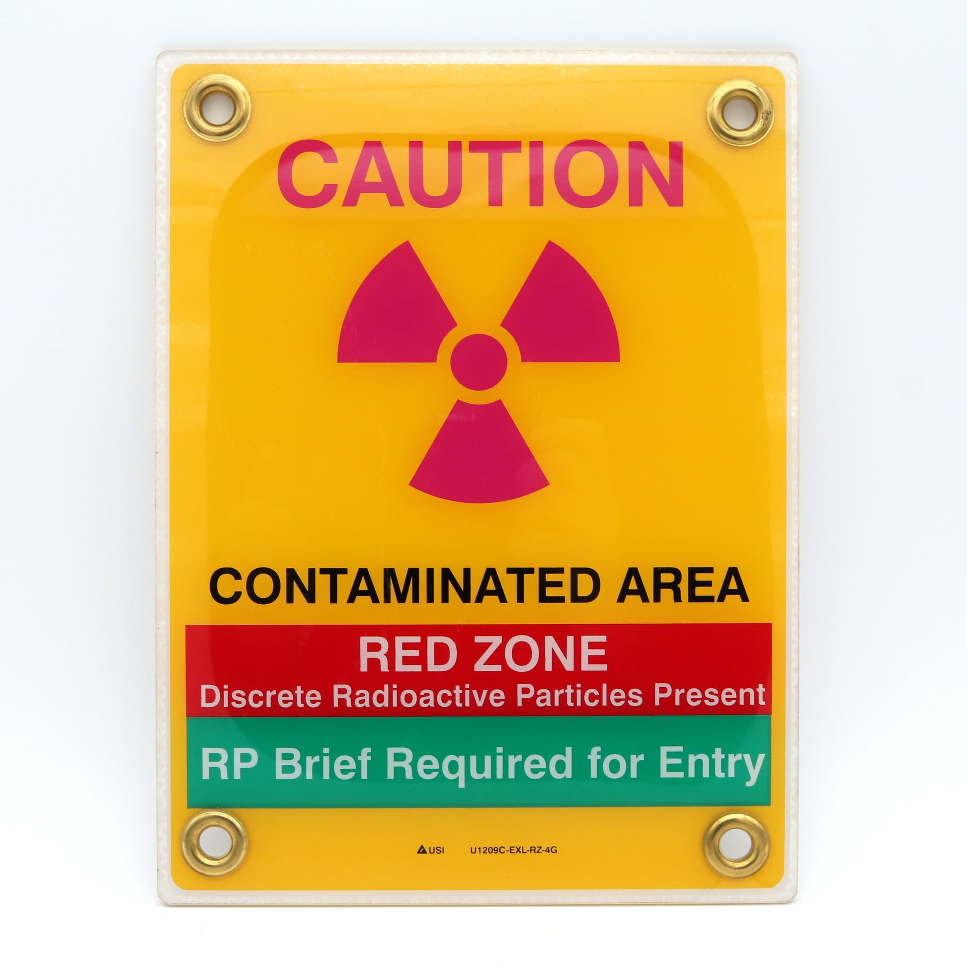 Warning sign indicating a contaminated area with radioactive particles.