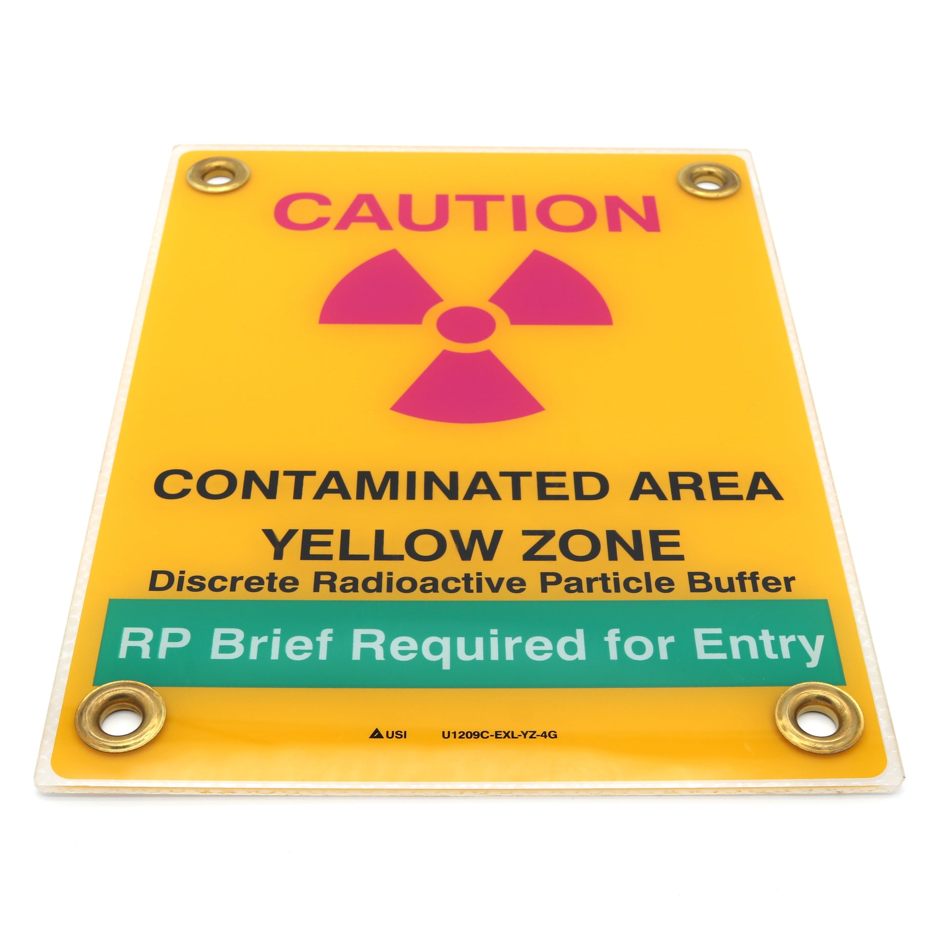 Warning sign indicating a contaminated area with radiation symbol on a yellow background