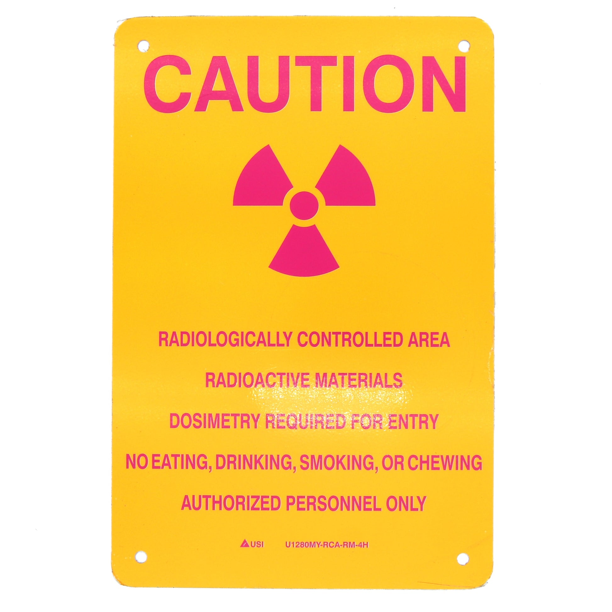 Yellow caution sign with pink radiation symbol and text on a white background
