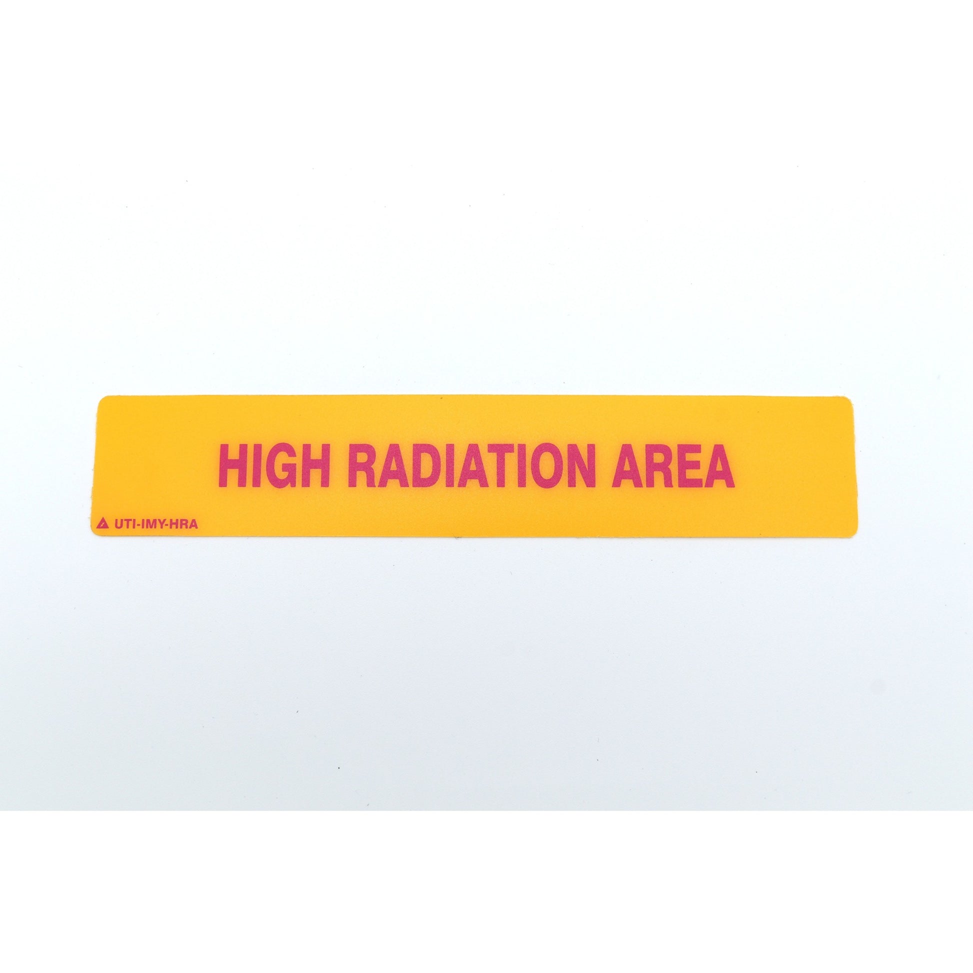 Yellow sign with 'HIGH RADIATION AREA' text on a white background