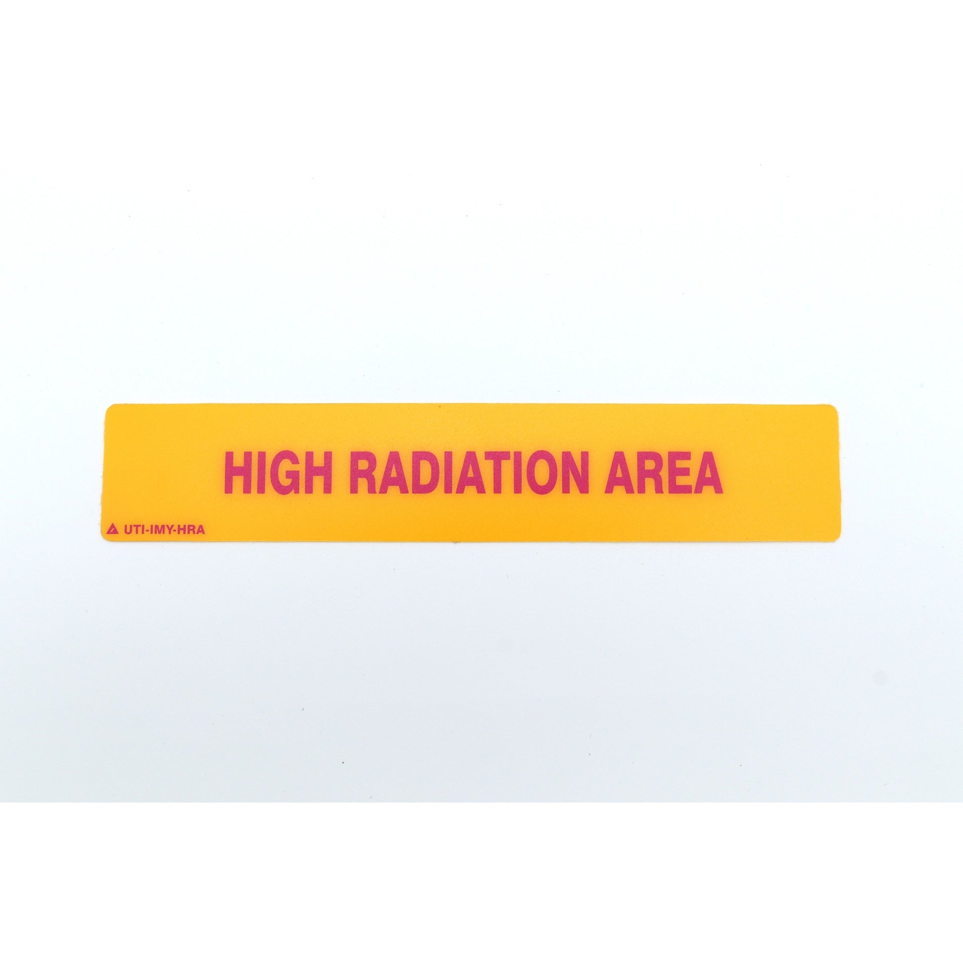 Yellow sign with 'HIGH RADIATION AREA' text on a white background