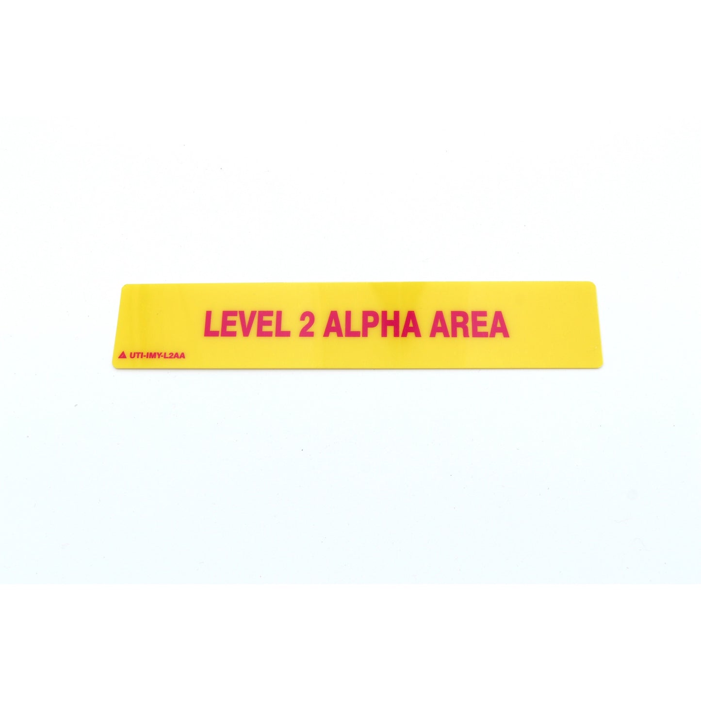 Yellow and red label with 'LEVEL 2 ALPHA AREA' text on a white background