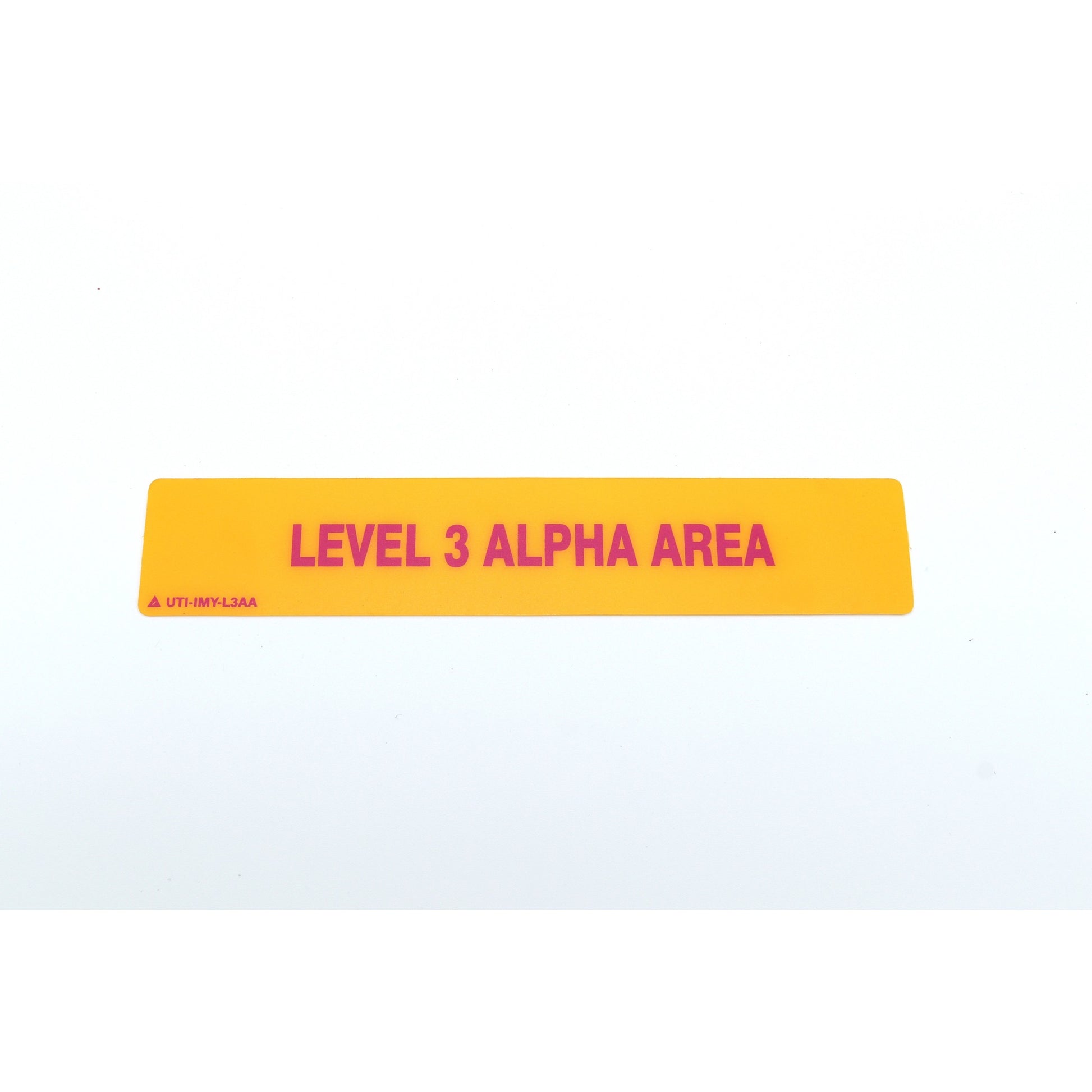 Yellow and pink sign with 'LEVEL 3 ALPHA AREA' text on a white background