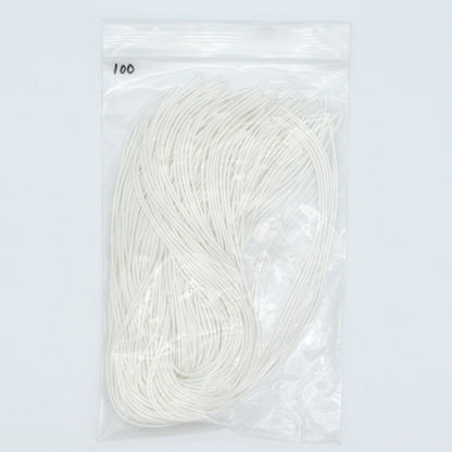 Packaged white elastic cords on a light gray background
