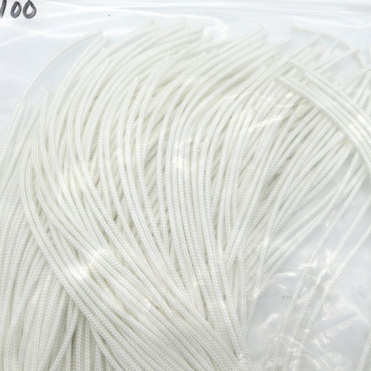 Close-up of white yarn on a clear background