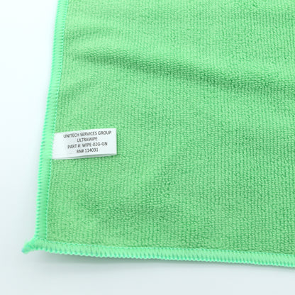 Green microfiber cloth with a label on a white background