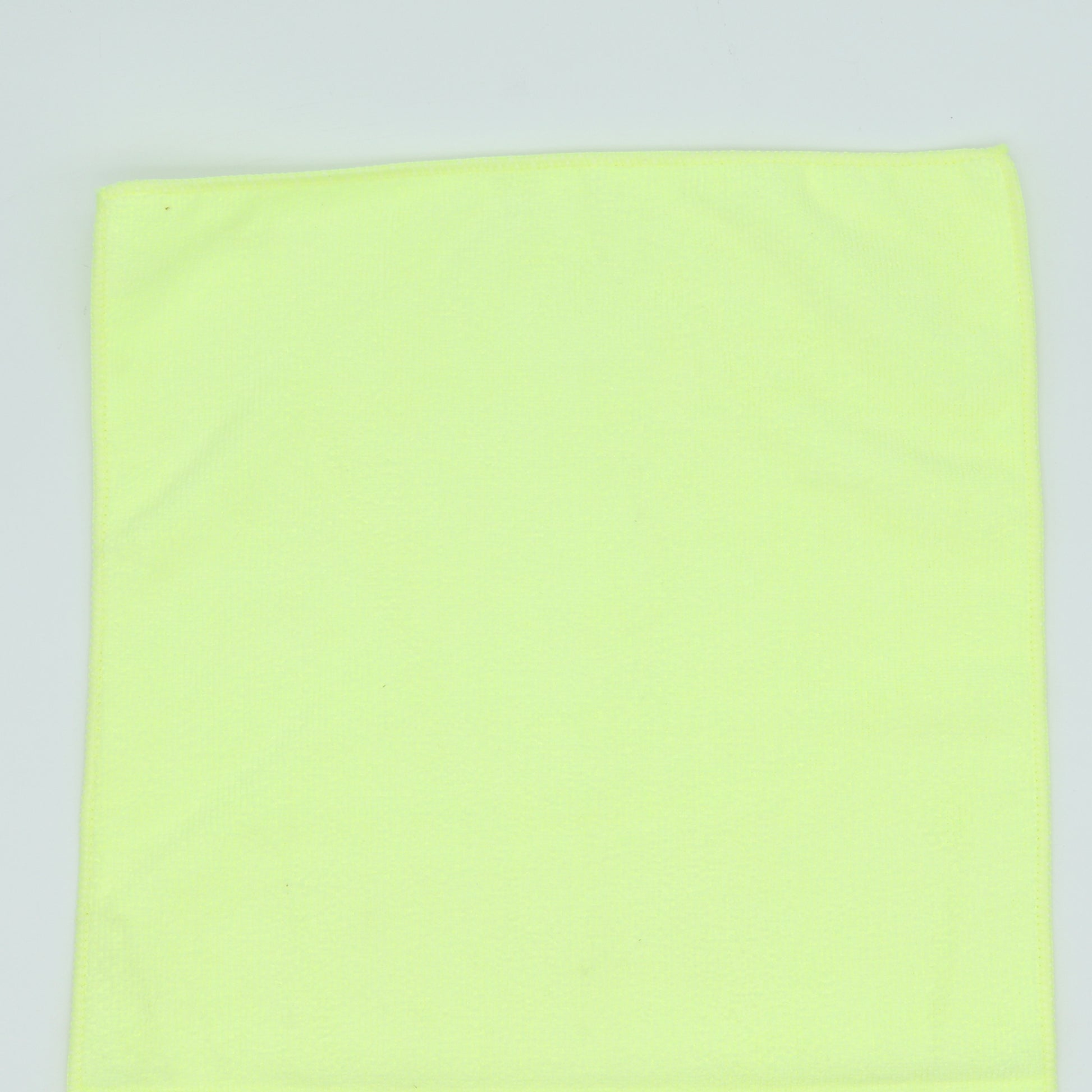 Light green fabric on a light gray background