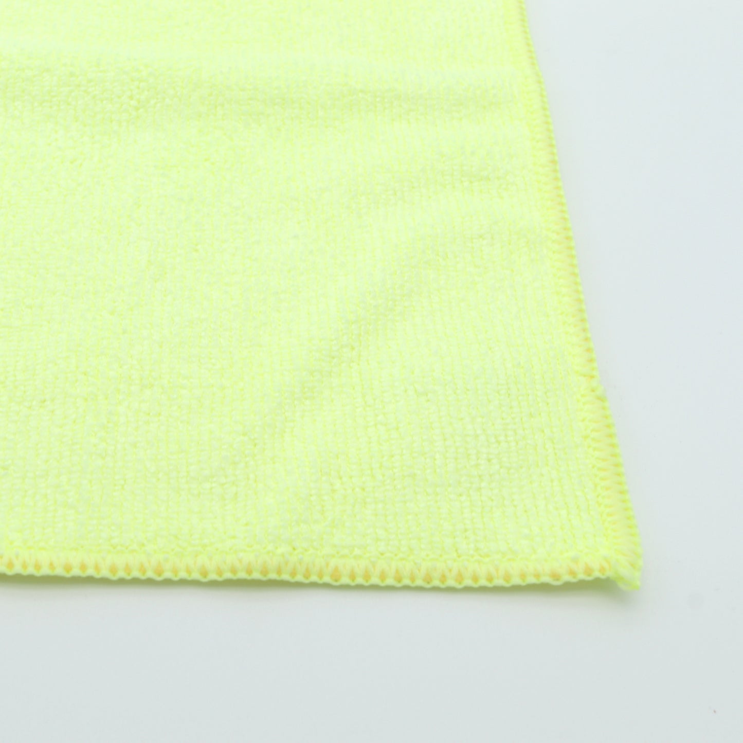 Yellow microfiber cloth on a white background