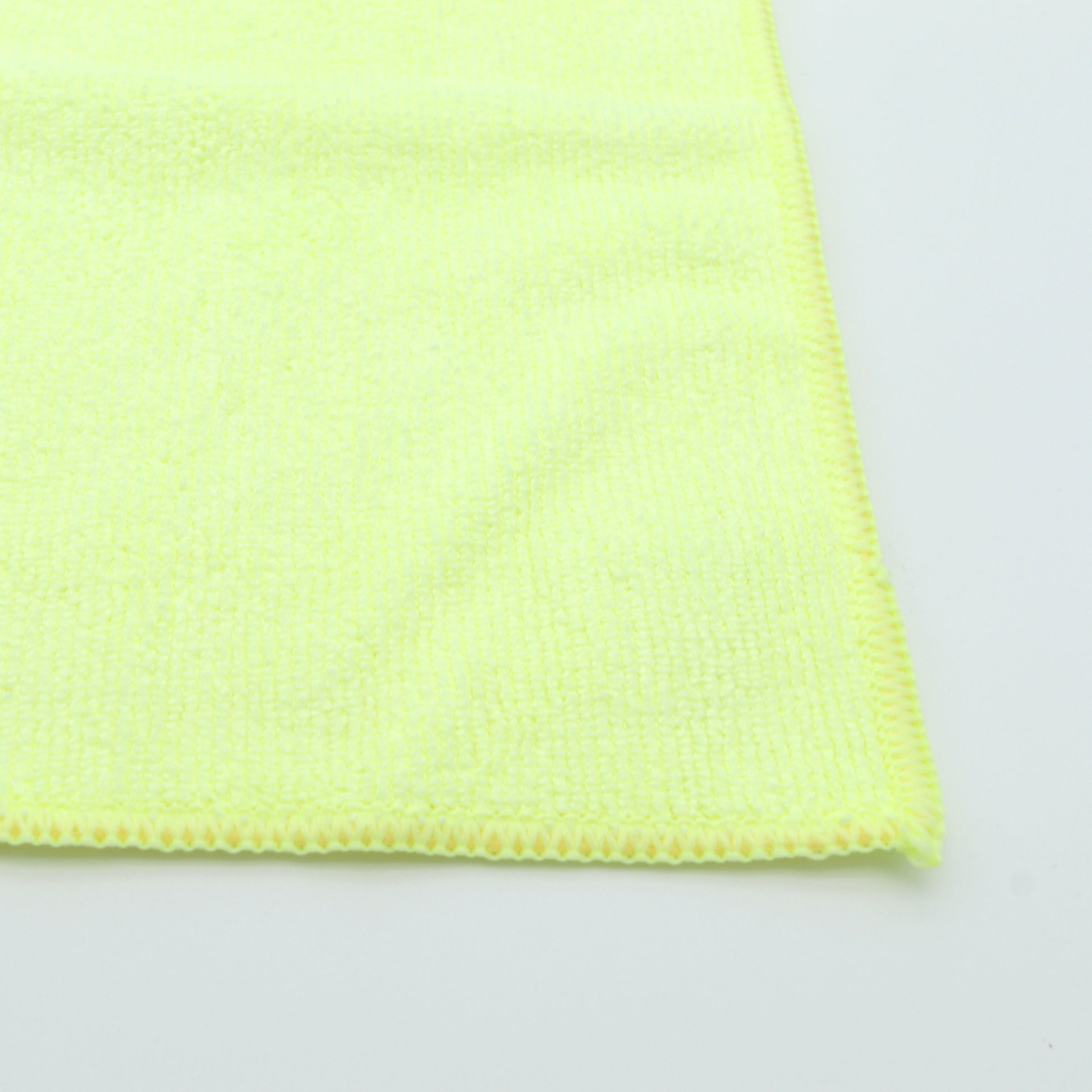 Yellow microfiber cloth on a white background