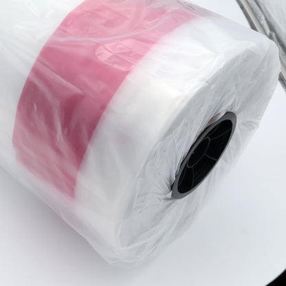 Roll of pink and white material on a white background
