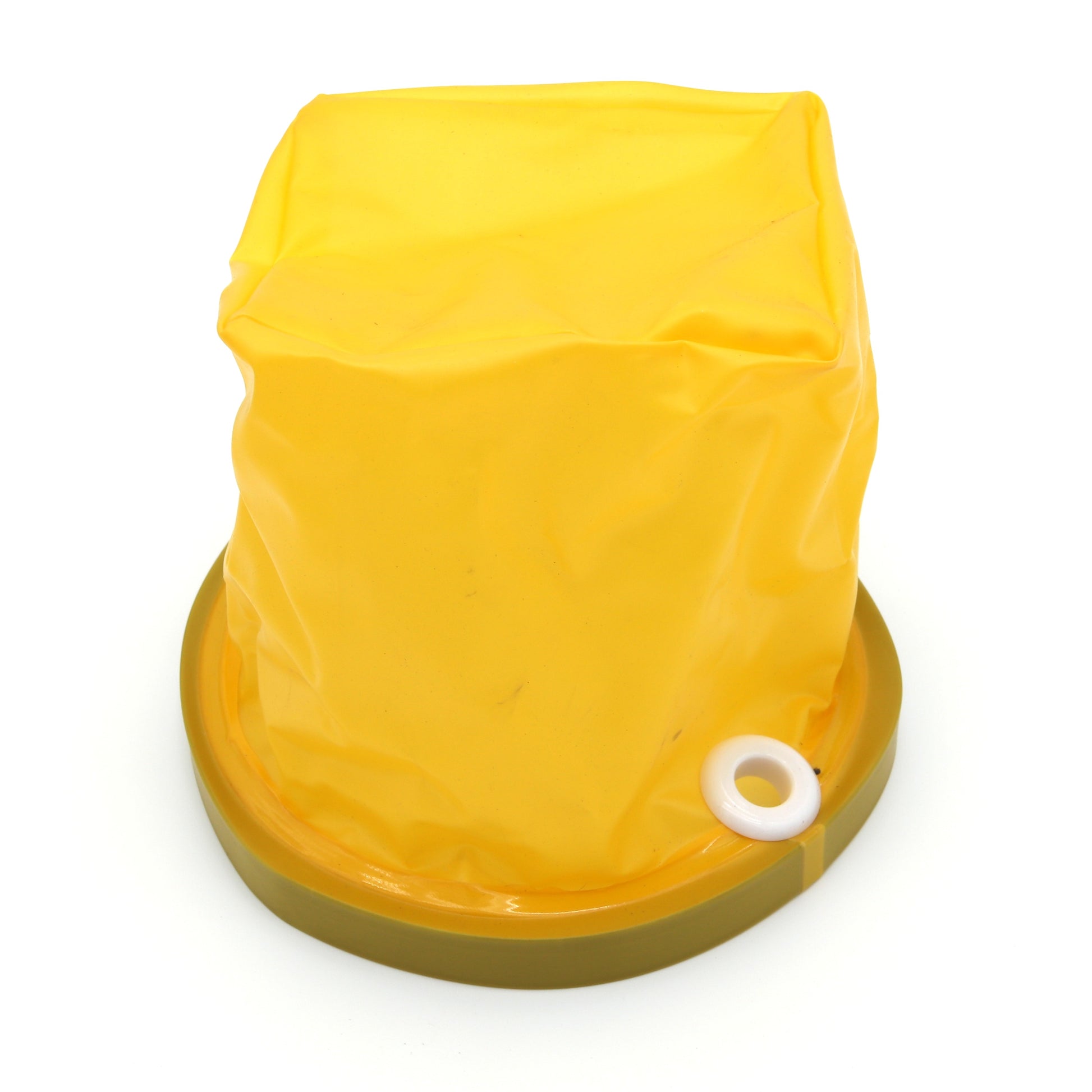 Yellow plastic bag with a white ring on a white background