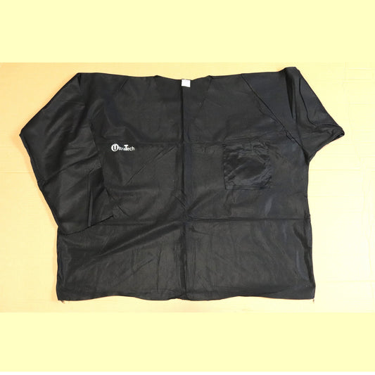 Black scrub shirt with a brand logo on a beige background