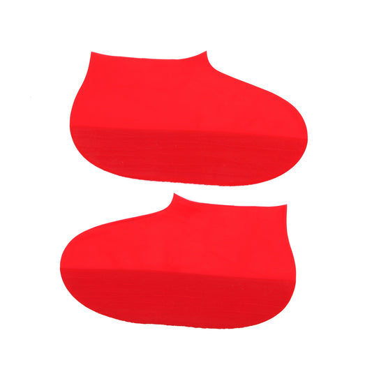 Two red shoe inserts on a white background