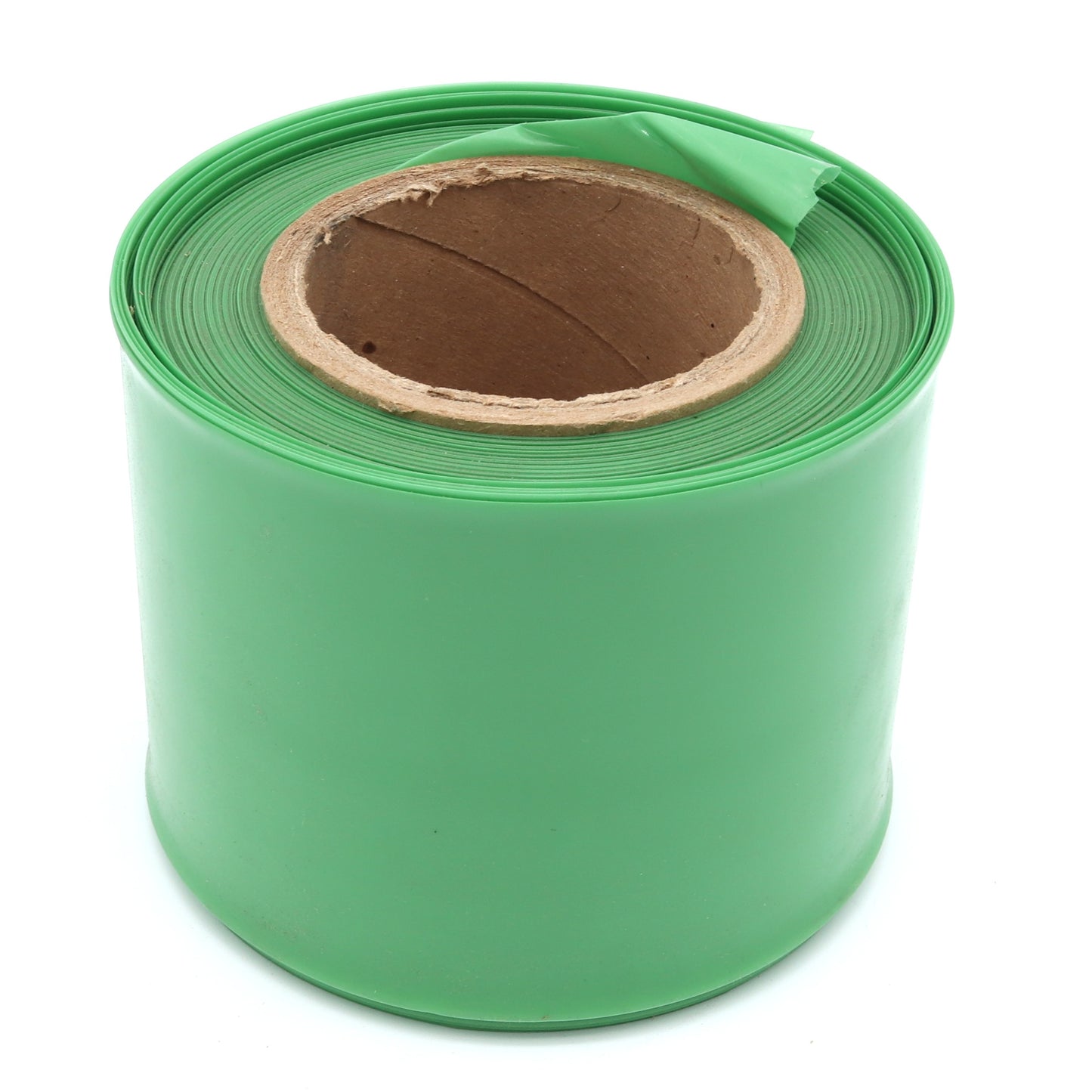 Roll of green plastic sheeting on a white background