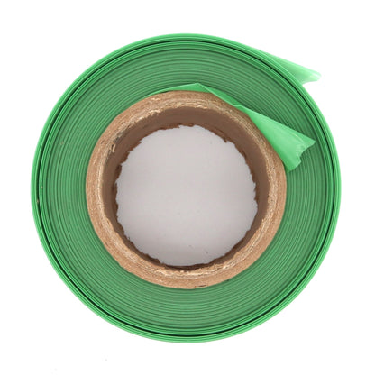 Roll of green tape on a white background