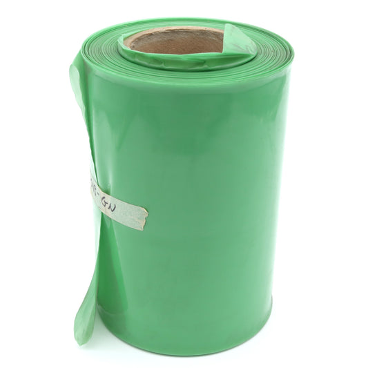 Green roll of plastic sheeting on a white background