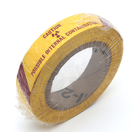 Roll of yellow tape with text on a white background